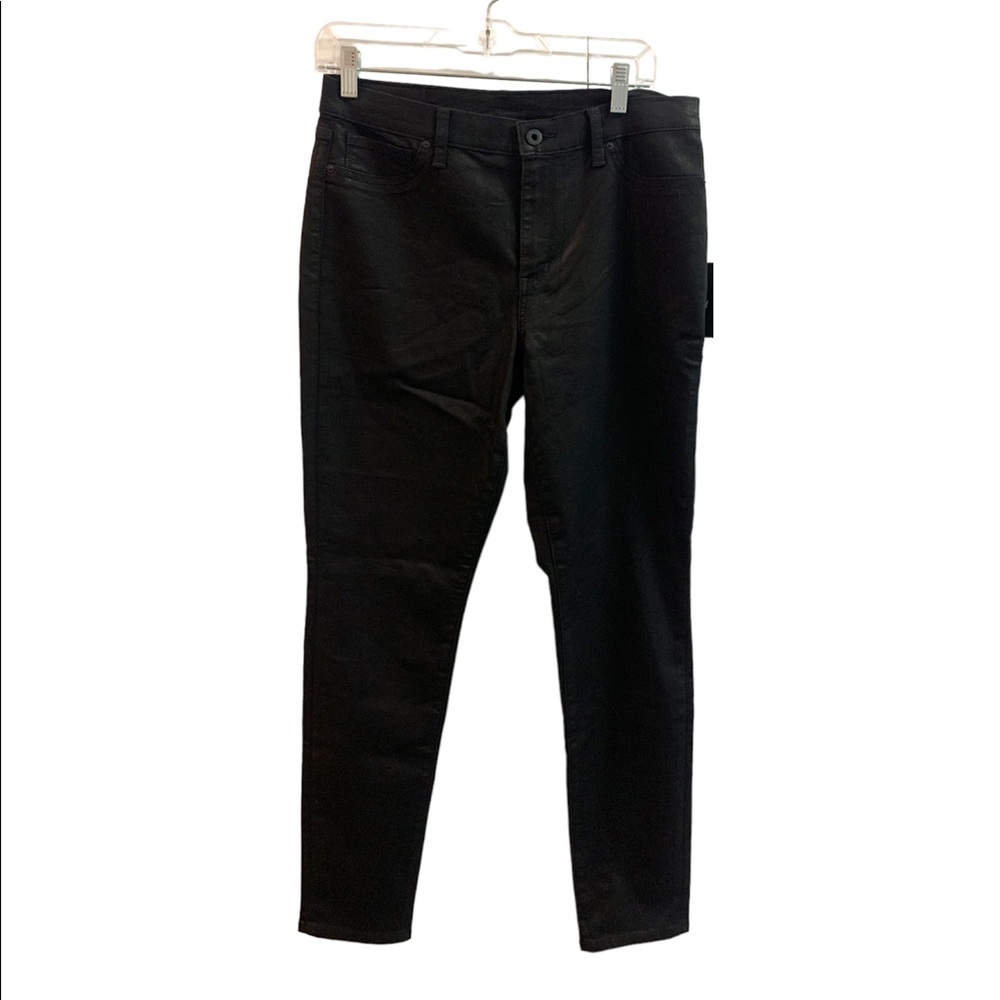 DKNY Black skinny jeans NWT black button and rivets size 30